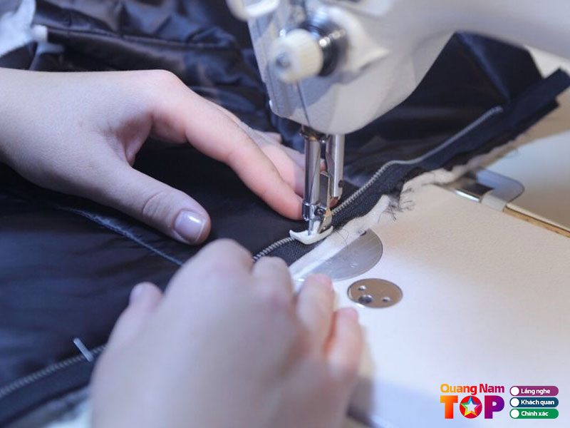 Sua-quan-ao-dang-hanh-quangnamtoplist